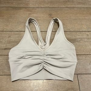 ALO Wild Thing Ruched V Neck Sports Bra in Bone